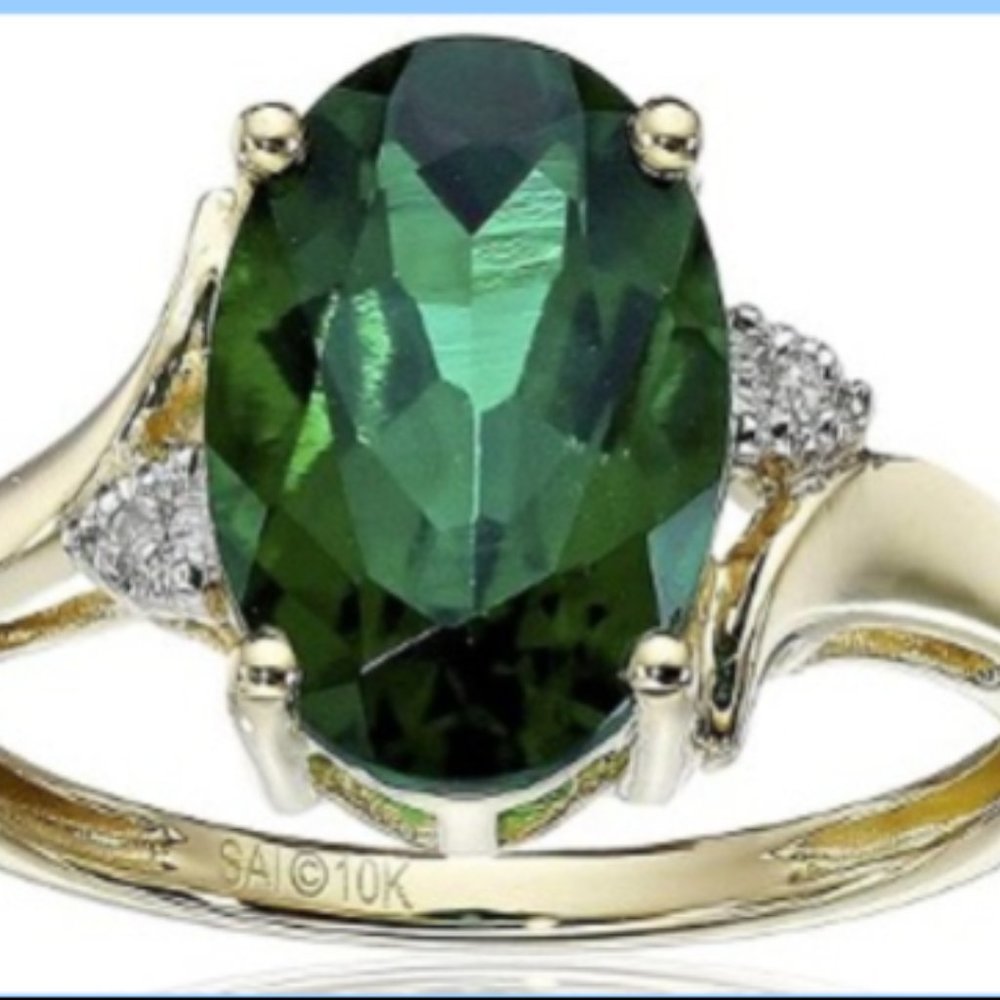 2.44 CT EMERALD AND DIAMOND RING